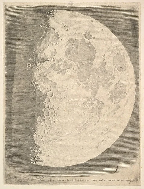 The moon at first quarter, lit down one side, the terminator running ragged from top to bottom and the dark half completely gone.